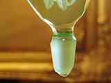 Stunning antique Czech glass perfume bottle ornate stopper, uranium glass glow.