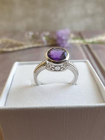 Detailed sterling silver amethyst solitare ring
