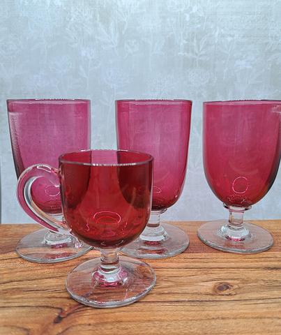 Collection of four Victorian era Cranberry glasses